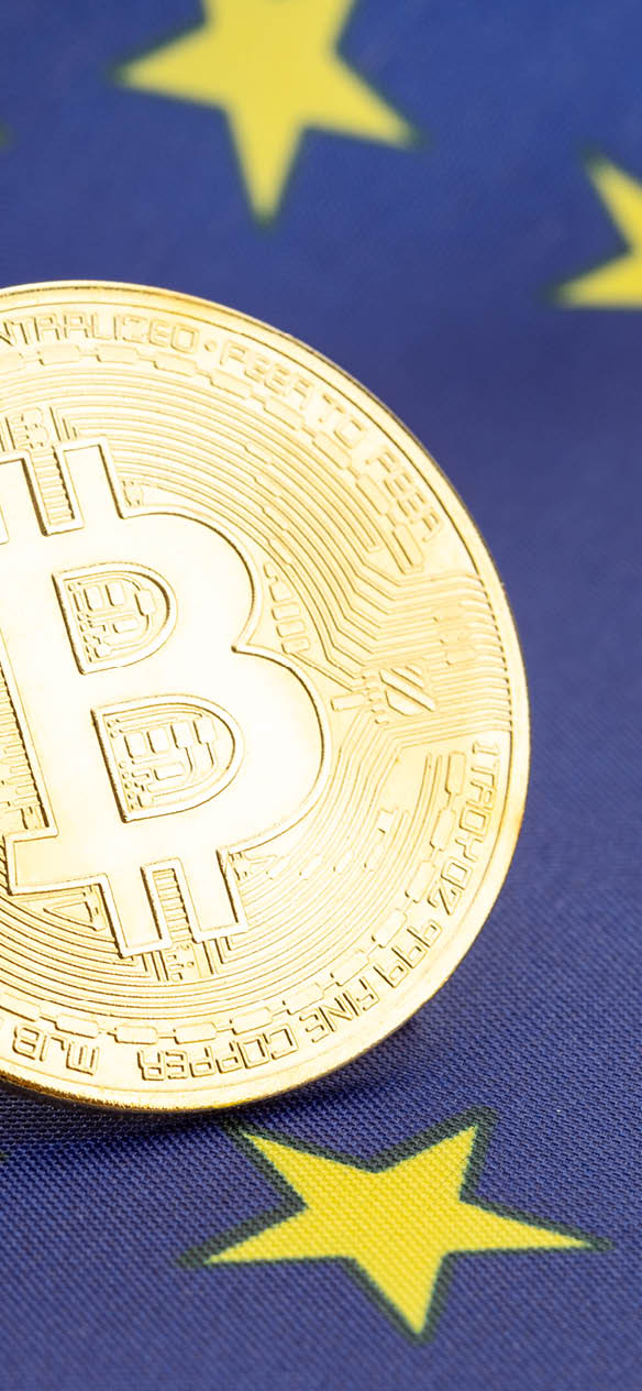 Bitcoin cryptocurrency coins on national flag of European Union. Crypto law regulation concept